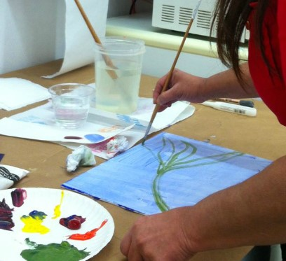 Student painting in Sharon's class